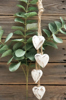 Four Antique White Wooden Hearts on Jute String