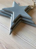 Set of Three Grey Wooden Stars